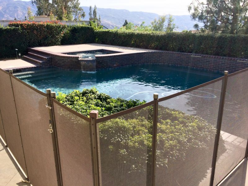 Mesh Fence Along Pool Perimeter